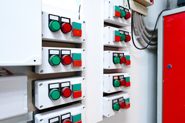 Poster - control panel with multiple switches and indicators used for industrial automation in a factory sett