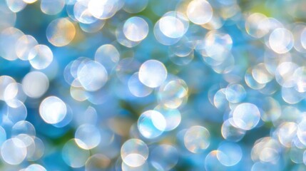 Poster - Soft blue bokeh lights blend to form a gentle, abstract background perfect for creative projects or calming visuals