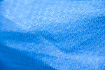 Poster - Background blue surface fabric luxury. Selective focus
