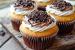 © Ева Поликарпова - Delicious treats with creamy frosting and chocolate decorations