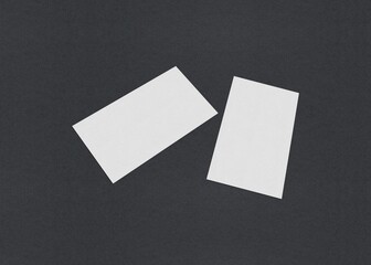 Poster - Two white rectangles on a gray background, minimalistic abstract design, Blank white Business card mockup stacks at grey textured paper background