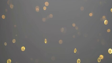 Wall Mural - Create a slow-motion video of gold dust particles gently drifting through the air against a black background. Add subtle glowing bokeh lights that shimmer .