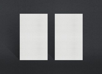 Poster - Two vertical white rectangular papers placed side-by-side against a dark background, Blank white Business card mockup stacks at grey textured paper background