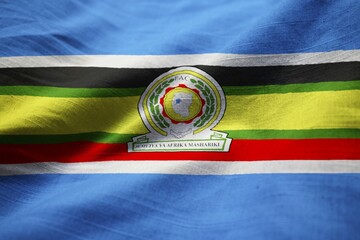 Poster - Closeup of Ruffled East African Community Flag, East African Community Flag Blowing in Wind