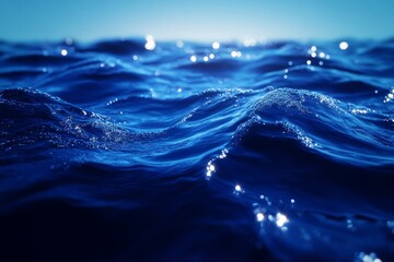 Aufkleber - Waves ripple gracefully under sunlight in a deep blue ocean during a calm afternoon