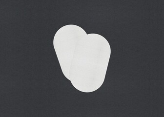 Poster - Two white oval sheets overlapping on a gray background, Blank white Business card mockup stacks at grey textured paper background