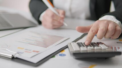 Poster - A highly skilled professional accountant diligently working to calculate important financial figures, utilizing various documents and data to ensure accuracy and reliability in their computations