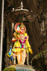 Wall Mural - Statue of Kartikeya with peacock, Murugan or Subramanya in Batu Caves, Kuala Lumpur, Malaysia.