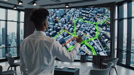 Leinwandbilder - Innovative urban planning demonstration featuring holographic map technology in a modern office setting