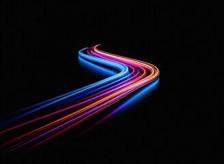 Fototapete - Vibrant, multicolored light trails curve and flow across a dark background, creating an abstract, dynamic composition.  The streaks of light suggest movement and energy.
