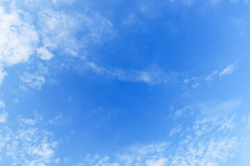 Wall Mural - beautiful blue sky and white fluffy group of clouds with sunrise in the morning, natural background