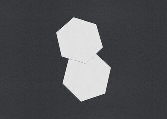 Poster - Two white hexagonal sheets overlapping on a dark background, Blank white Business card mockup stacks at grey textured paper background
