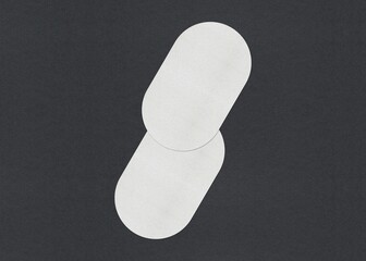 Poster - Two overlapping white ovals on a black background, Blank white Business card mockup stacks at grey textured paper background