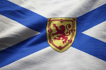 Poster - Closeup of Ruffled Nova Scotia Flag, Nova Scotia Flag Blowing in Wind
