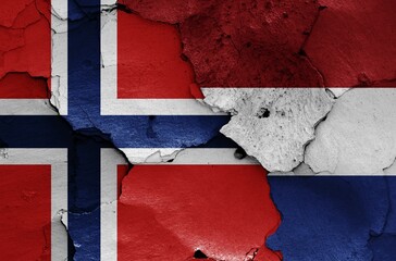 Wall Mural - Flags of Norway and Netherlands painted on cracked wall