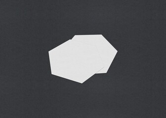 Poster - Two hexagonal white sheets on a dark background arranged in an overlapping manner, Blank white Business card mockup stacks at grey textured paper background