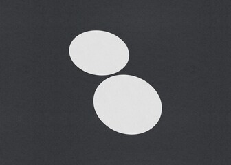 Poster - Two white circular sheets partially overlapping on a dark background, Blank white Business card mockup stacks at grey textured paper background