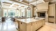© Pannee - A high-end open-plan kitchen with beige cabinets and a white marble island.