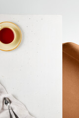 Aufkleber - Minimalist Tabletop with Tea and Silverware Elegant Composition and Light Play