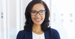 © peopleimages.com - Happy, glasses and portrait of businesswoman in office with confidence for legal career growth. Smile, pride and female corporate attorney from Mexico with positive attitude for case in workplace.