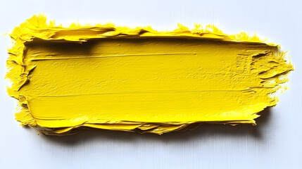 A textured golden yellow paint stroke isolated on a white background, representing artistic expression, modern design, and creative abstract brushwork with a bold and vibrant style