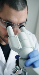 Wall Mural - dedicated researcher concentrating on detailed microscopic analysis within wellequipped laboratory e