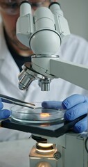 Wall Mural - Dedicated researcher concentrating on detailed microscopic analysis within wellequipped laboratory environment