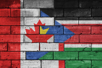 Wall Mural - colourful painted big flag of canada and flag of south sudan on a massive old brick wall background. concept