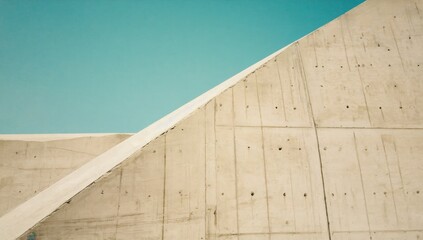 Wall Mural - dark concrete wall texture with soft lighting, industrial and minimalistic, high-resolution