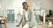 © peopleimages.com - Portrait, smile and black woman in business on desk, office or corporate workplace in Nigeria. Confident African professional entrepreneur on table, happy worker and employee, consultant and advisor