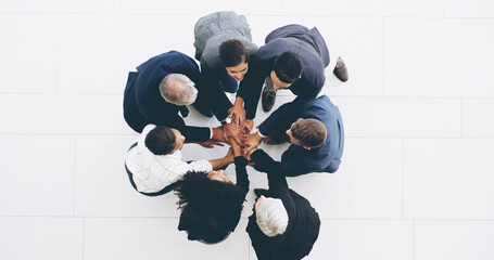 Poster - Business people, meeting and hands together with teamwork above for motivation or collaboration at office. Top view, group or employees piling in unity or solidarity for trust, support or mission