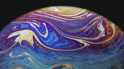 Wall Mural - Closeup video of a soap bubble showing thin film interference concept and the resulting different colors of light with each moving and swirling shapes. Perfect for illustrating concepts of physics.