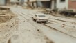 © musa - Miniature car on dusty track, shallow depth of field, depicting post-disaster scene.