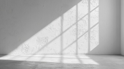 Poster - Soft rays of sunlight cascade through an unseen window, casting intricate shadows upon the smooth, clean surface of a white plaster wall. The serene atmosphere invites reflection and creativity