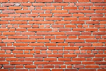 Poster - Close-up of a red brick wall with mortar lines, evenly aligned, forming a textured background.
