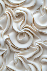 Sticker - A close-up of intricate, textured white swirls, resembling soft frosting or fabric, showcasing smooth, flowing curves and layered patterns.