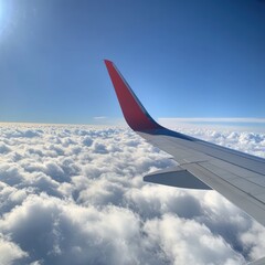 Fototapete - View of airplane wing against fluffy clouds and bright blue sky during a flight. Generative AI