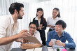 © InfiniteFlow - Group of diverse office worker employee working together on strategic business marketing planning in corporate office room. Positive teamwork in business workplace concept. Prudent