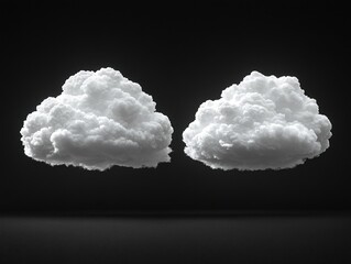 Poster - Two fluffy white clouds hover in a serene manner against a deep black backdrop, creating a striking contrast
