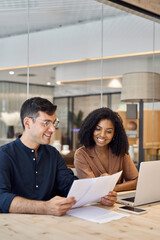 Aufkleber - Diverse professional partners using laptop discussing document in office. Business team of two employees man and woman, manager and client talking on financial report working at work meeting. Vertical
