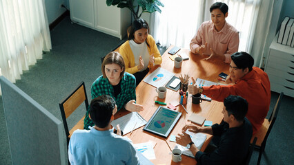 Poster - Top view of attractive diverse team clapping hands while project manager present creative idea at meeting room. Diverse team working together planning marketing strategy at meeting room. Convocation.