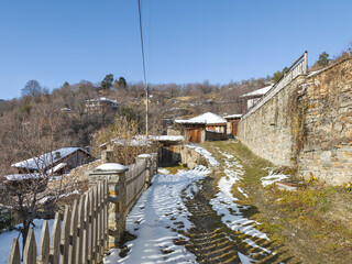 Wall Mural - Winter Sunset view of Village of Kovachevitsa, Bulgaria