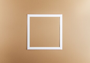 Poster - White frame with copy space lying on brown wall creating a modern and minimalist composition, ideal for showcasing artwork, photographs, or text