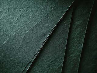 Poster - Close-up of overlapping dark green slate sheets forming diagonal lines, highlighting the natural texture and pattern of the stone, suitable for backgrounds and design projects