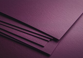 Poster - Close-up view of a stack of dark purple textured paper sheets, creating an elegant and sophisticated backdrop perfect for various design projects and artistic endeavors