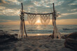 © MacAttack Creations - beach wedding arch decor with macrame and flowers at sunset