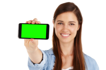 Poster - Happy woman, portrait and green screen with phone for marketing, advertising or mockup space on a white studio background. Female person, user or model with smile or mobile smartphone display for app