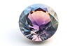 Round gem stone with multi-colored facets isolated on white for design use