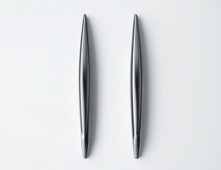 Aufkleber - Sleek, metallic, elongated handles on white background.