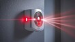 © Kunalai - Smoke alarm checks. Security alarm system with red laser indicators on a wall.